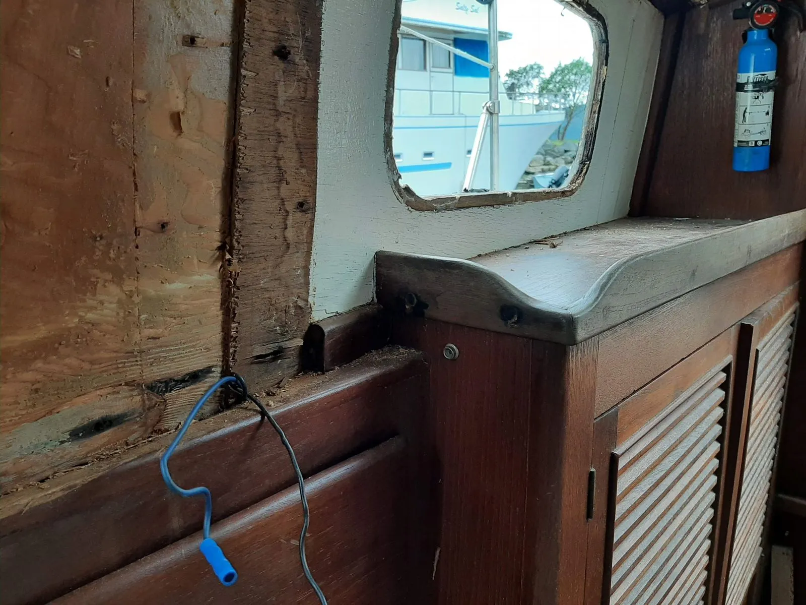 The bare interior hull of the boat during restoration