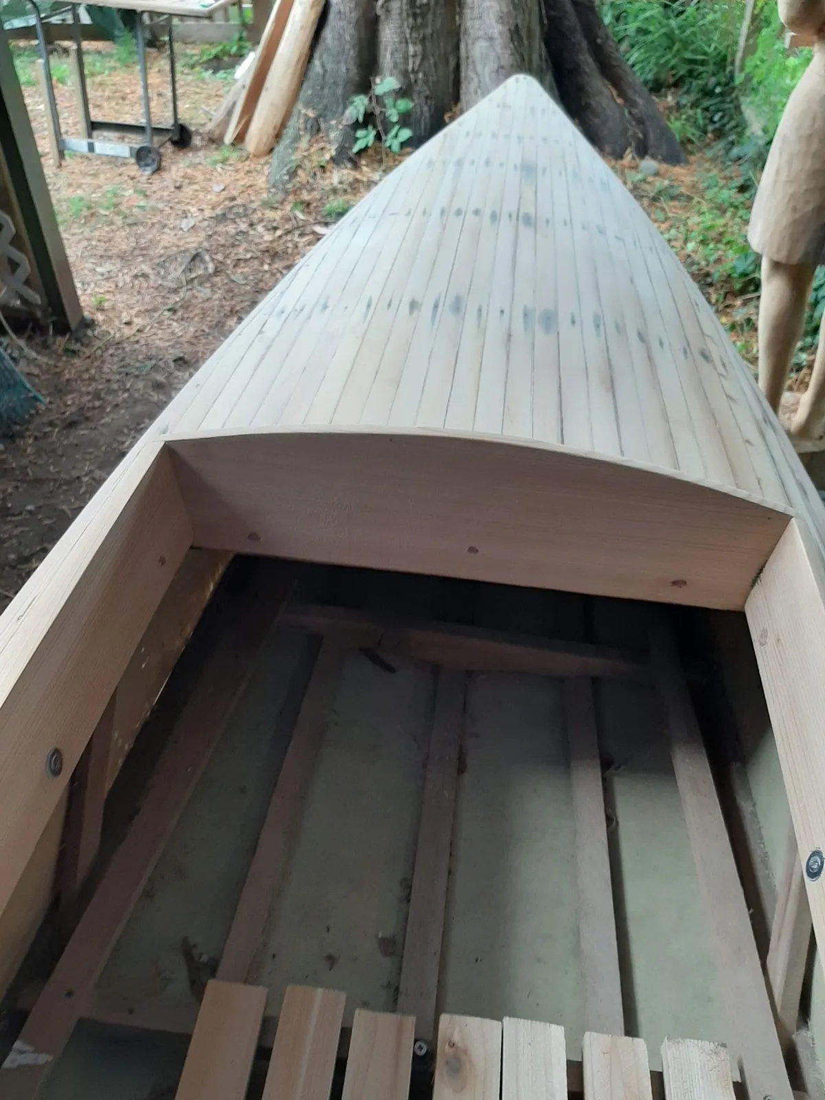 A restored cedar-strip canoe, finished