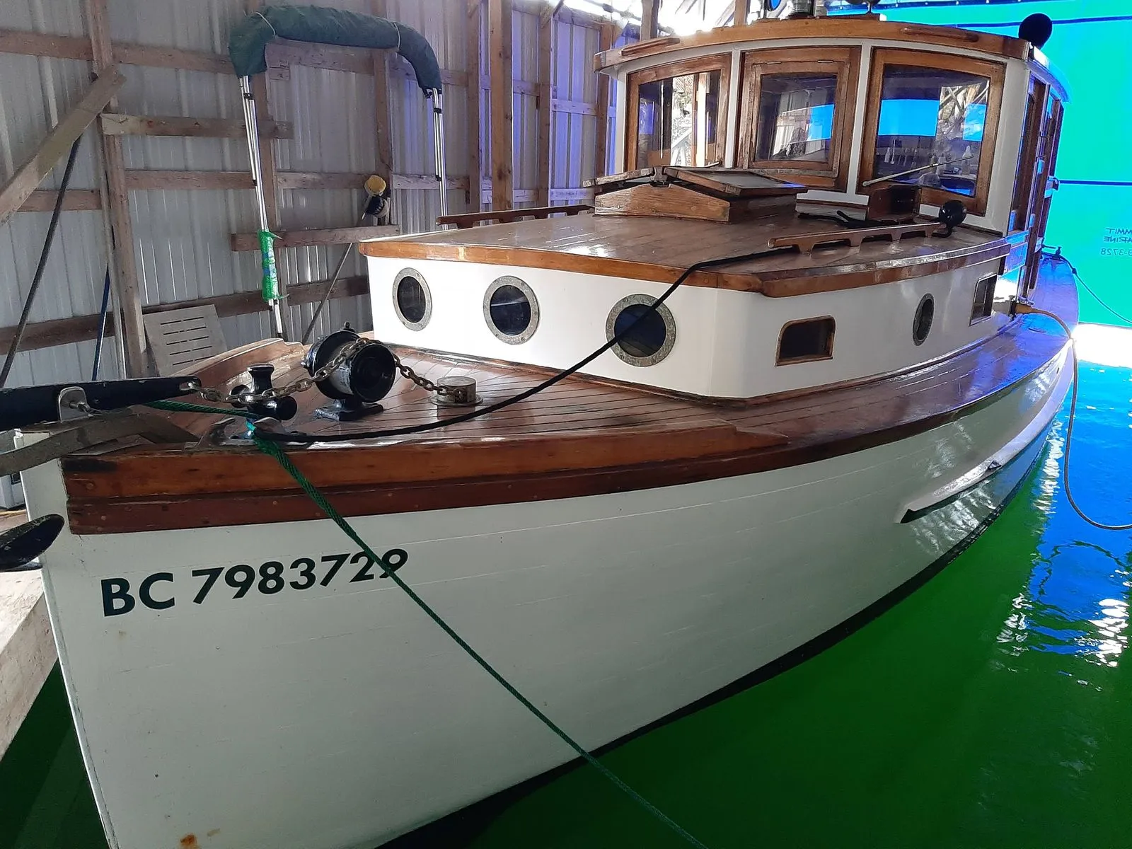 A restored classic wooden vessel afloat