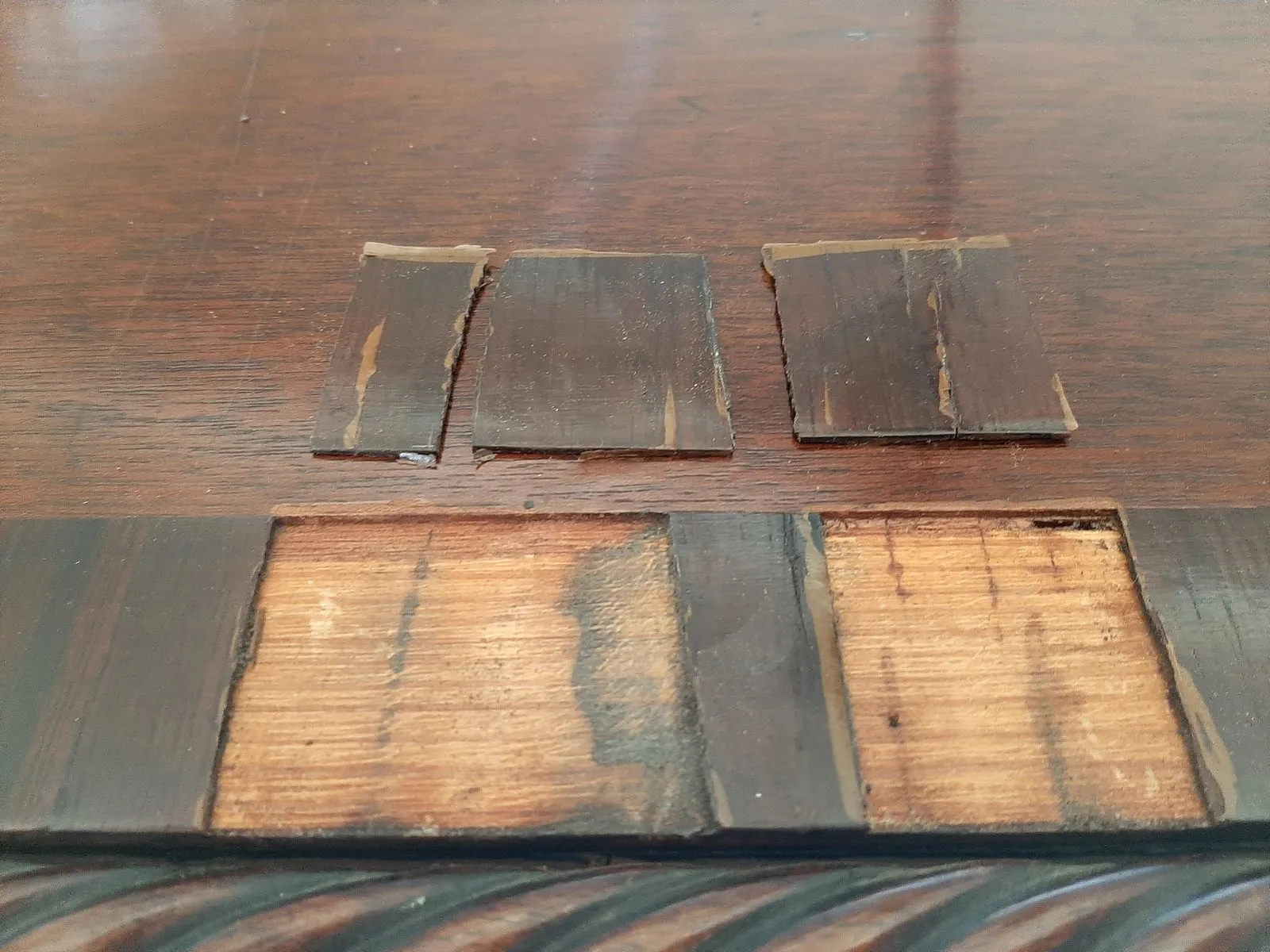 New veneer patches let into the top of the chest of drawers